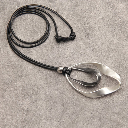 Elegant Twisted Texture Water Drop Pendant Necklace in Golden and Silvery with Black Rope, Zinc Alloy, Perfect Gift for Girlfriend, Suitable for Daily Wear and Special Occasions, Necklace